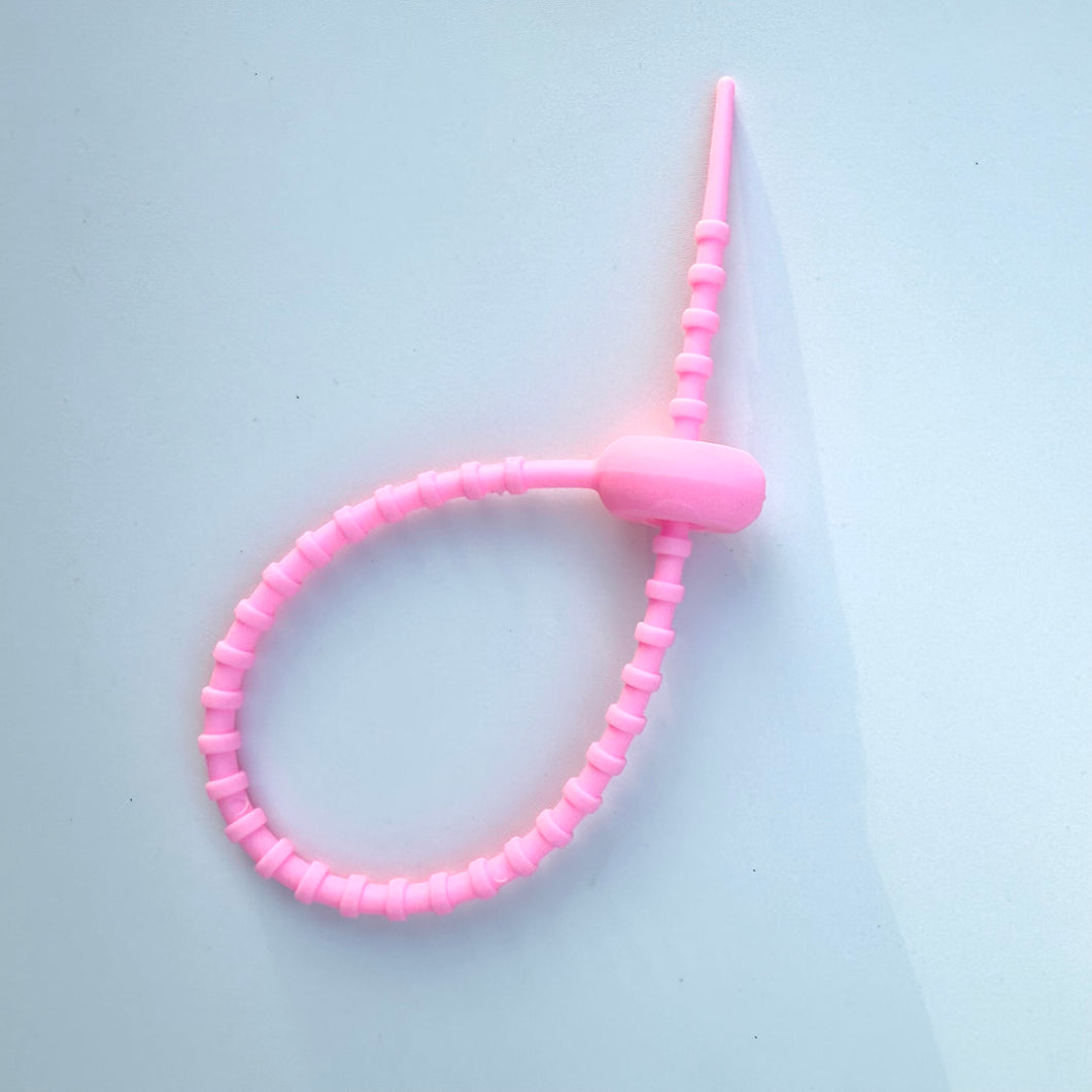 PINK RUBBER ADJUSTABLE BAG CHARM CONNECTOR