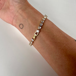 ´COLD HEART’ GOLD TENNIS BRACELET