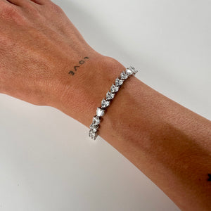 ´COLD HEART’ SILVER TENNIS BRACELET