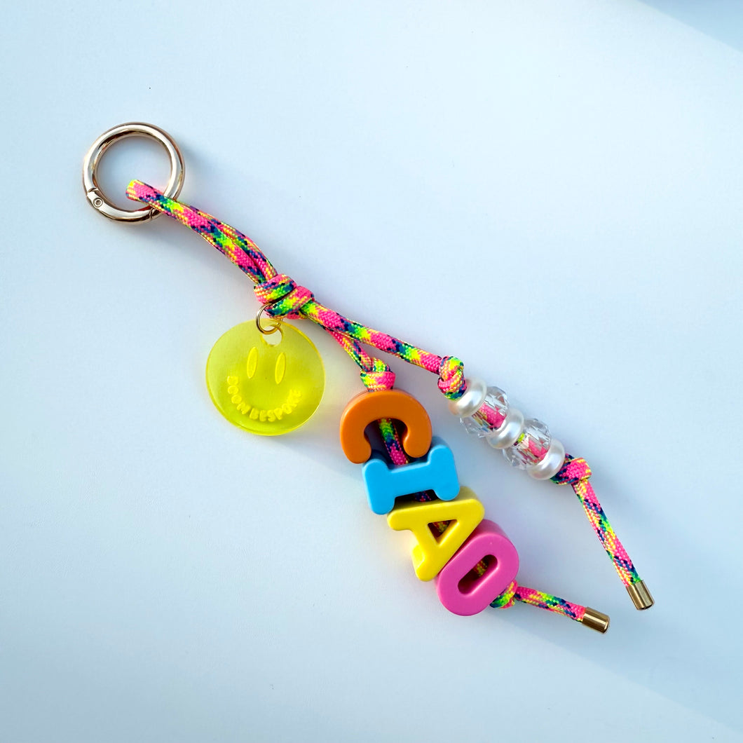 ‘CIAO’ BRIGHT CORD CRYSTAL BEADED BAG CHARM / KEYRING BY BOOMBESPOKE