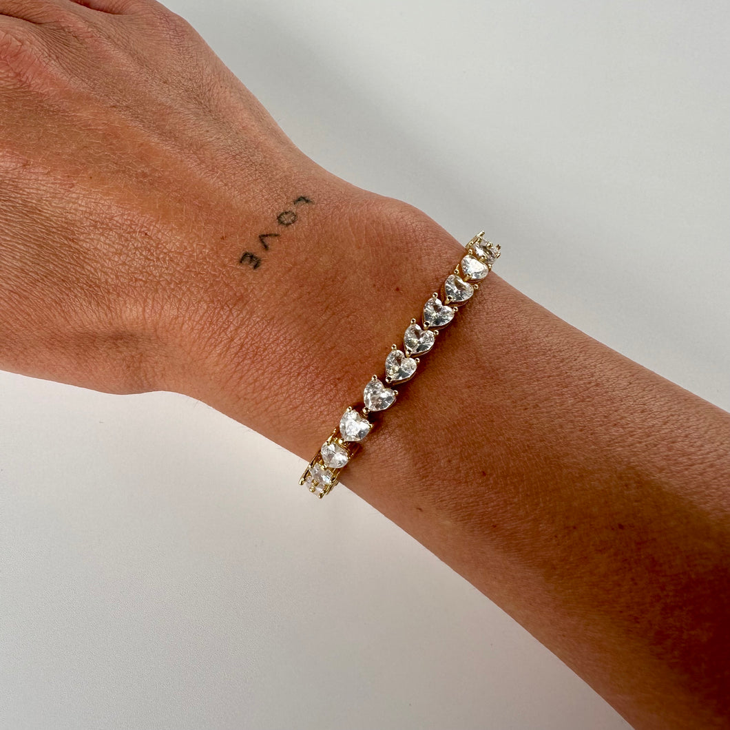 ´COLD HEART’ GOLD TENNIS BRACELET